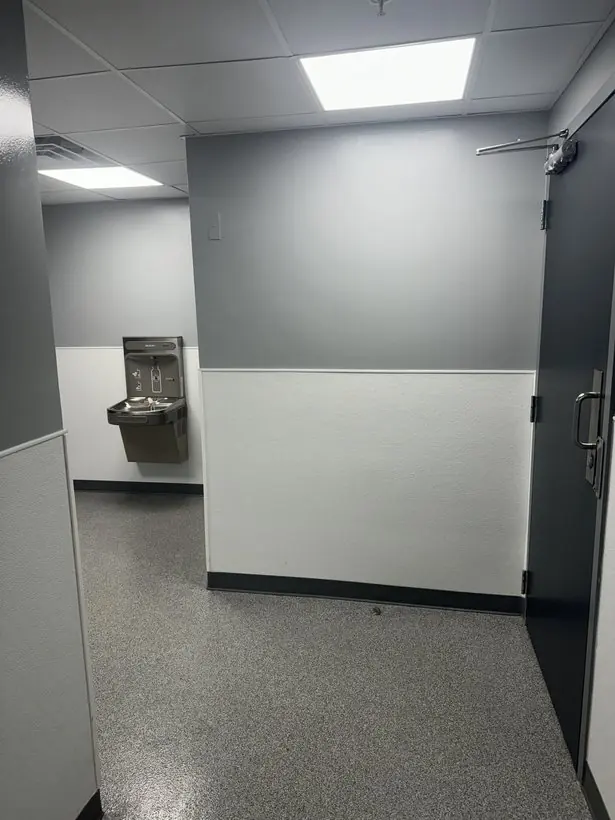 Fountain alcove — seamless around corners and cased openings — epoxy flake flooring by Vibrant Painting, Greenville SC