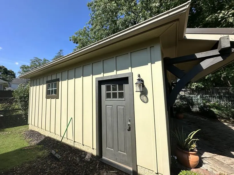 Board & batten exterior — siding, trim, and door — exterior painting by Vibrant Painting, Greenville SC