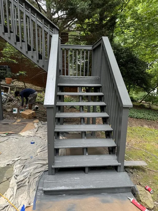Stair & rail detail — clean lines on every baluster — exterior painting by Vibrant Painting, Greenville SC