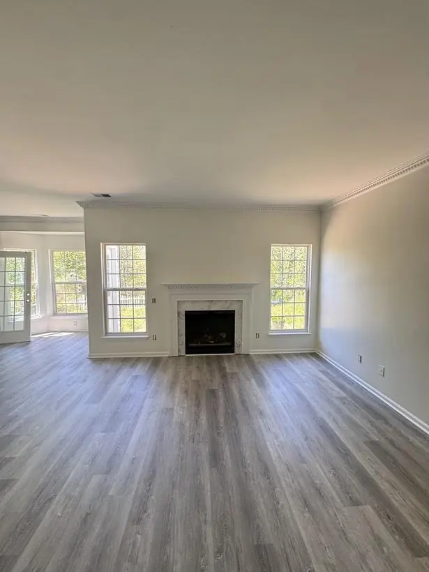 Dining room — chair rail, crown & bay window — whole-home repaint by Vibrant Painting, Greenville SC