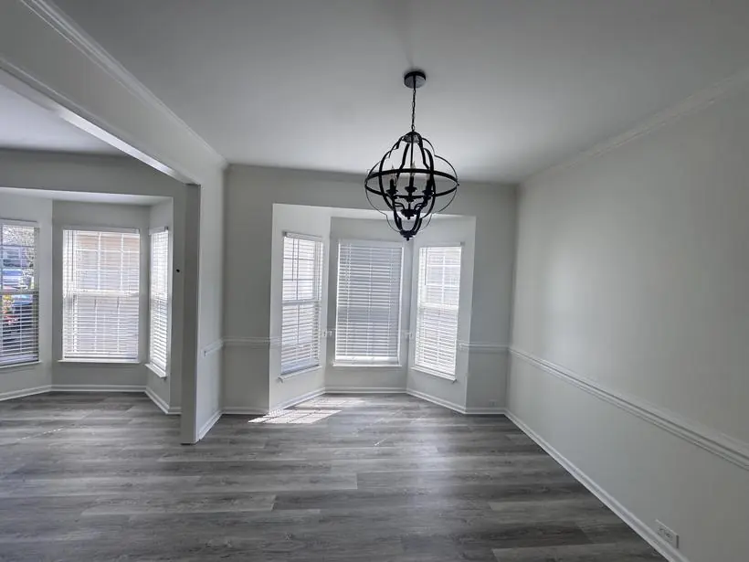 Dining, second angle — clean lines on every edge — whole-home repaint by Vibrant Painting, Greenville SC