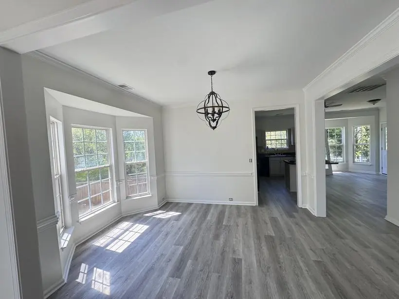 Open living — walls, columns, and ceilings — whole-home repaint by Vibrant Painting, Greenville SC
