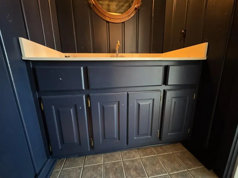 Navy vanity — cabinets and casework — lakefront home repaint by Vibrant Painting, Greenville SC