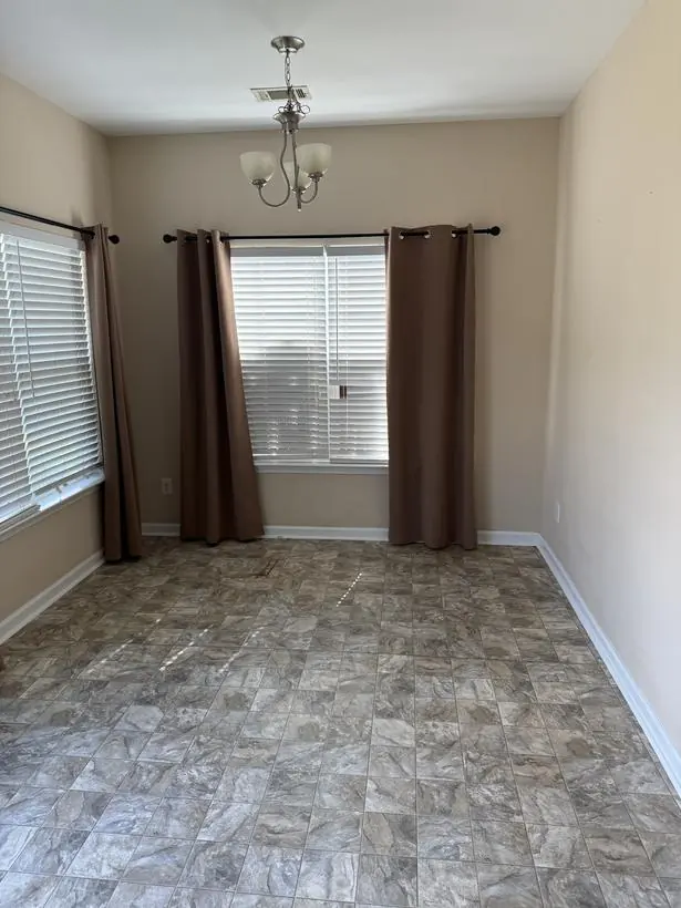 Dining room — walls, ceiling, and baseboards — make-ready turnover by Vibrant Painting, Greenville SC