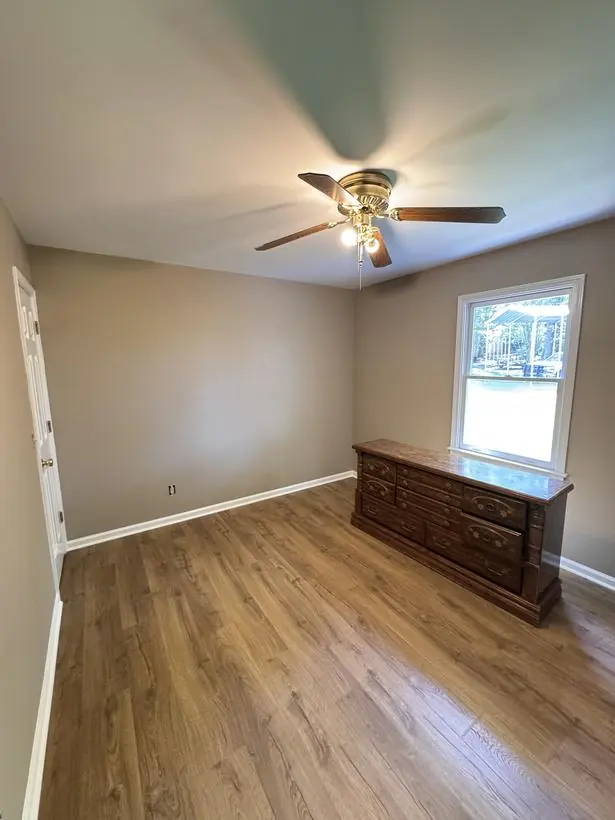 Bedroom — walls, ceiling, and trim — interior repaint by Vibrant Painting, Greenville SC