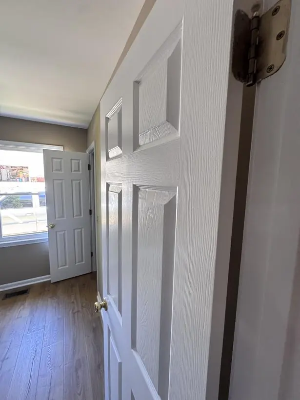 Interior doors — sprayed, hung, and detailed — interior repaint by Vibrant Painting, Greenville SC